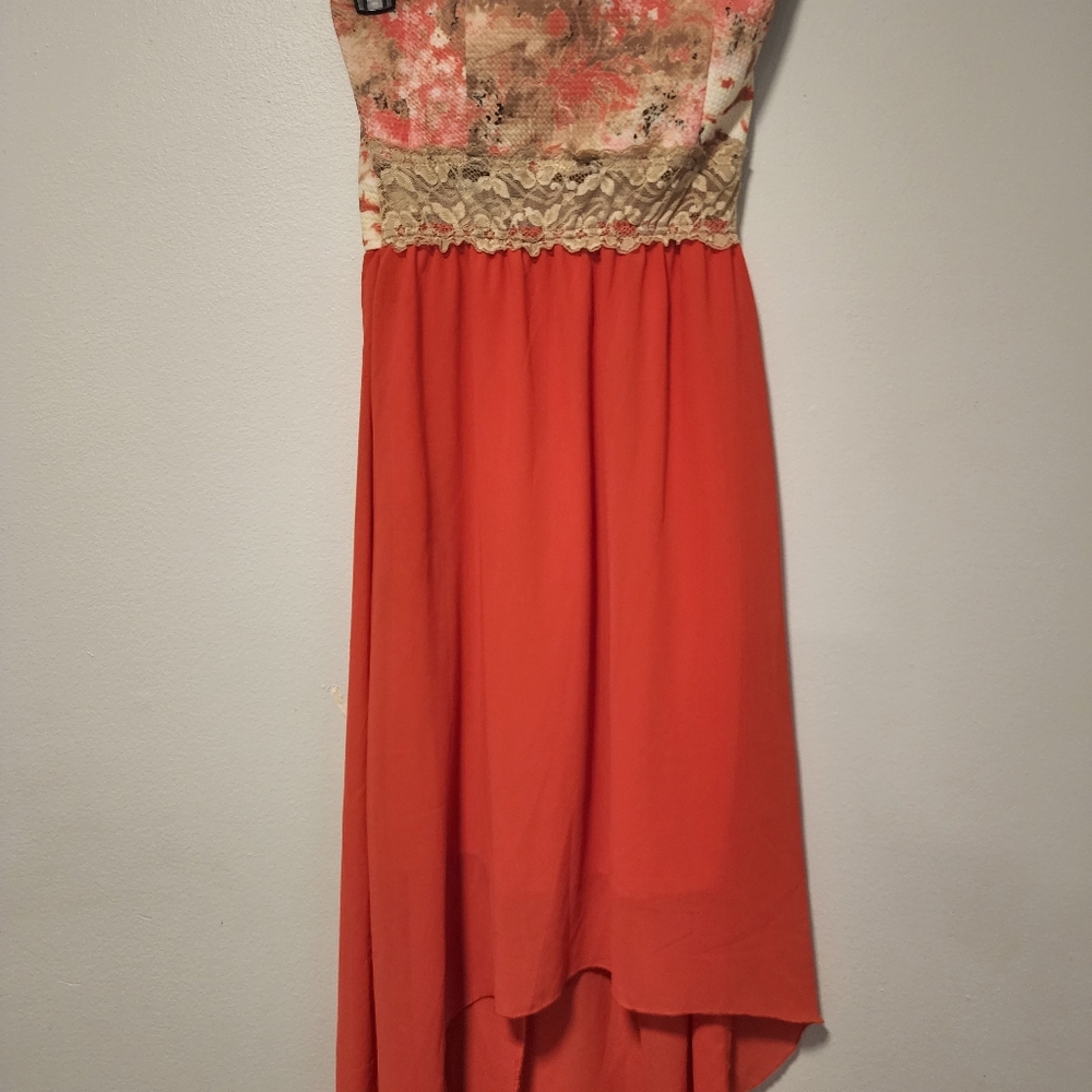 High low orange Sleeveless dress.